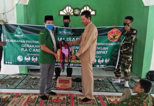 Salurkan Bantuan, PC GP Ansor Benteng Ajak Patuhi Prokes
