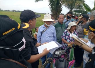 Polres Sergai Pengamanan Sidang Lapangan Perkara Perdata di Desa Pematang Cermai