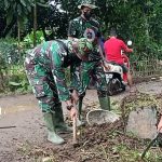 Satgas TMMD Ke-111 Rela Becek-Becekan saaat Membangun Jalan