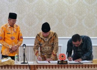 Gubernur Rohidin Teken NPHD Bawaslu Senilai Rp 50,6 M