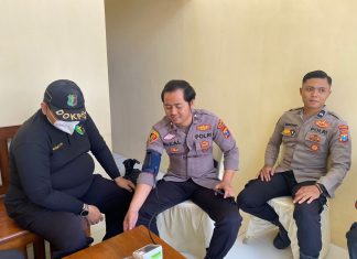 Kapolres Nganjuk Dorong Kesiapan Petugas Pam Operasi Ketupat 2024 dengan Pemberian Suplemen dan Cek Kesehatan