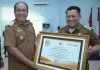 Bupati dan Wabup Asahan Hadiri Penyerahan SPPT PBB-P2 2025