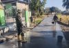 Jalan Sudah Dicor, Kini Satgas TMMD Pastikan Beton Tetap Prima dengan Penyiraman Berkala