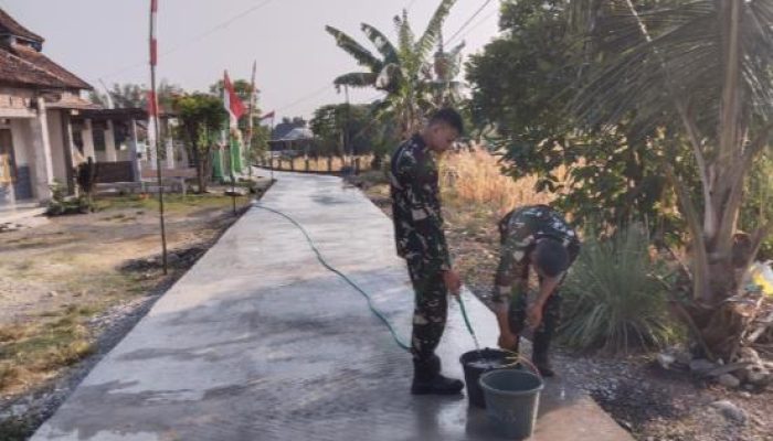 Cor Jalan Dijaga Sepenuh Hati, Satgas TMMD Pastikan Hasil Pembangunan Berkualitas